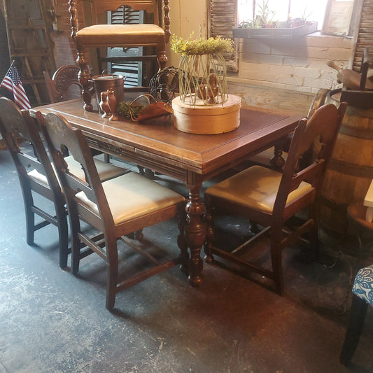 Antique table that extends with 5 chairs