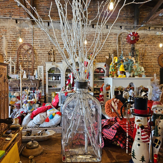 Glass vase with white glitter piks