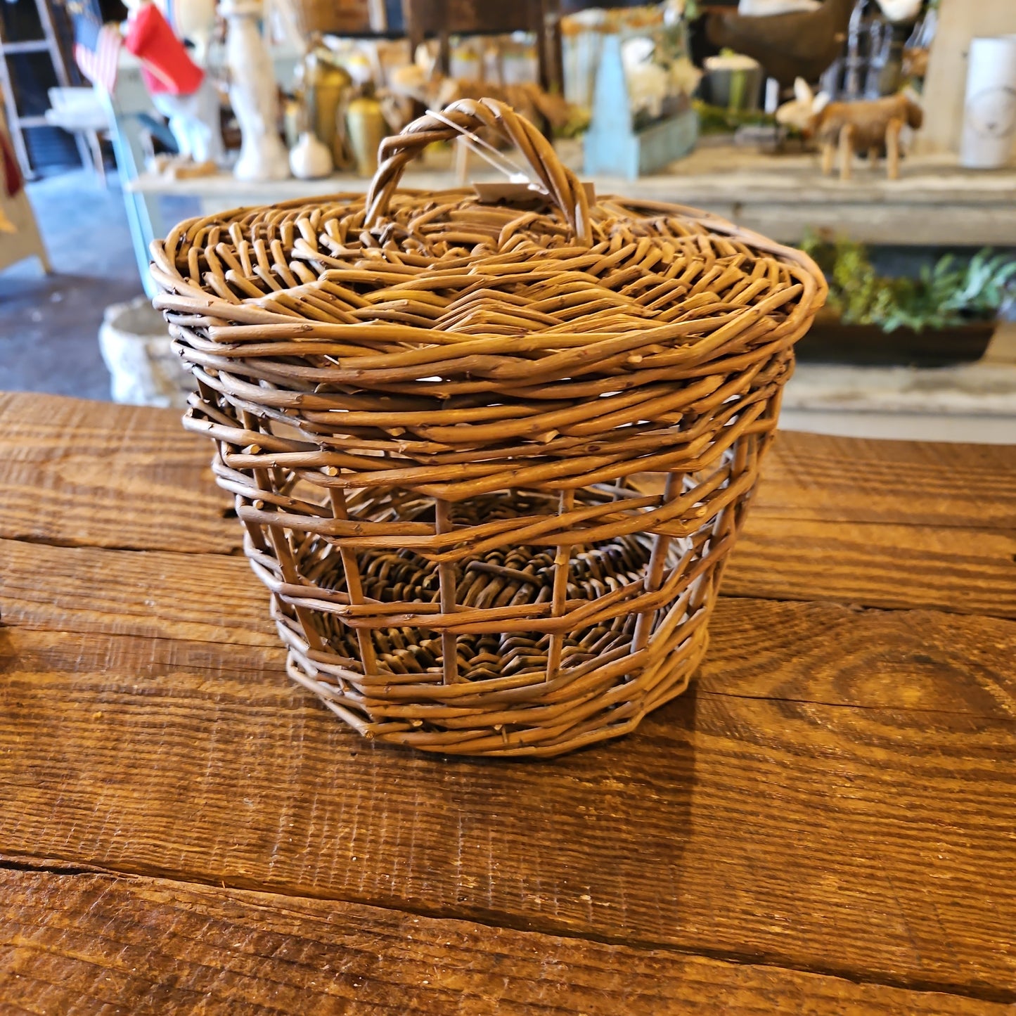 Woven wicker basket with lid
