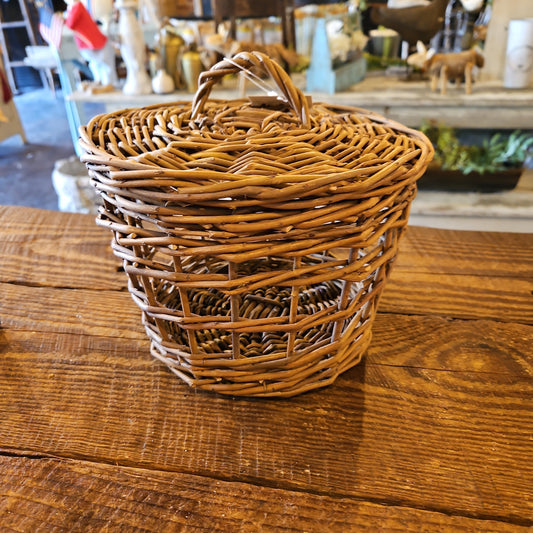 Woven wicker basket with lid