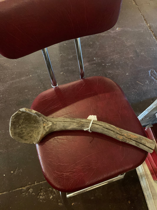 Primitive wooden hand carved spoon