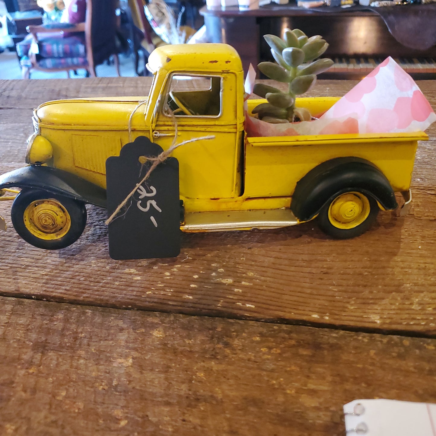 Yellow truck with succulent and bath bomb