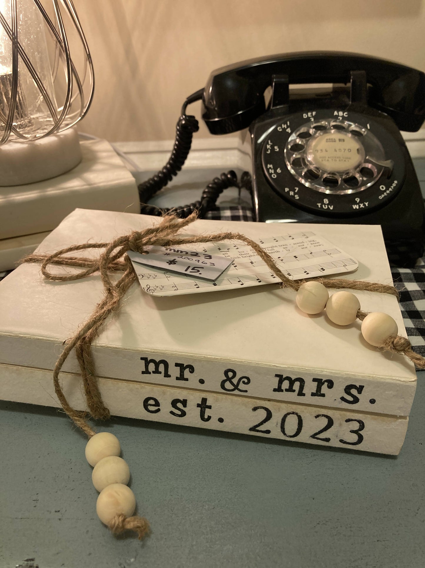 “mr. & mrs. est. 2023” bookstack