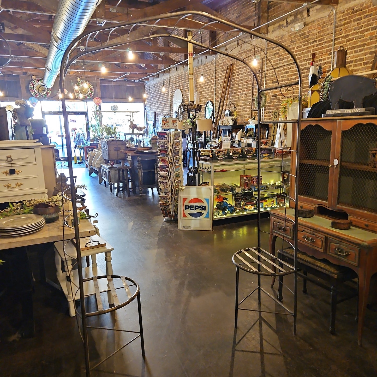 Metal arbor with chairs