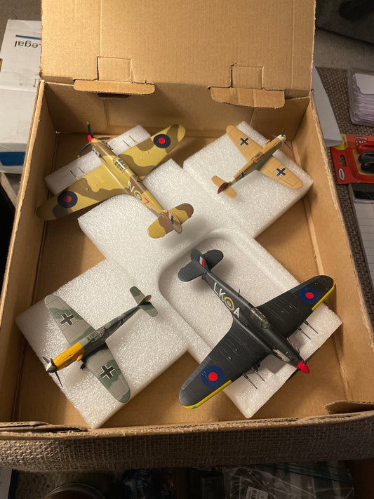 Model=two 1:42 & two 1:144 scale plastic WWII fighter planes
