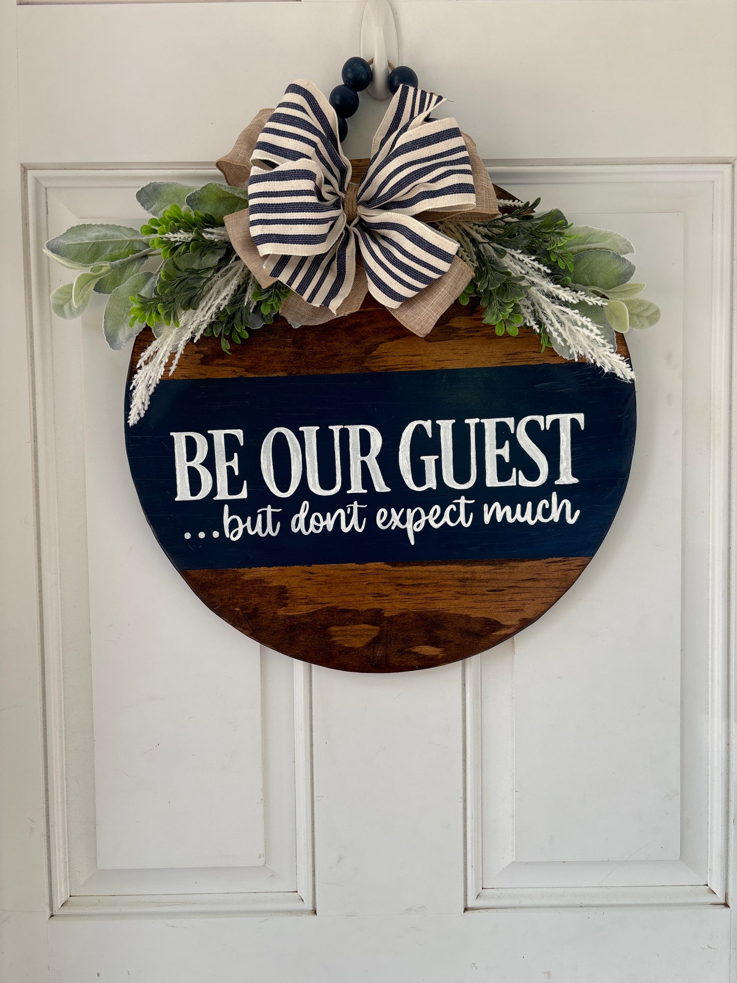 Be our guest sign