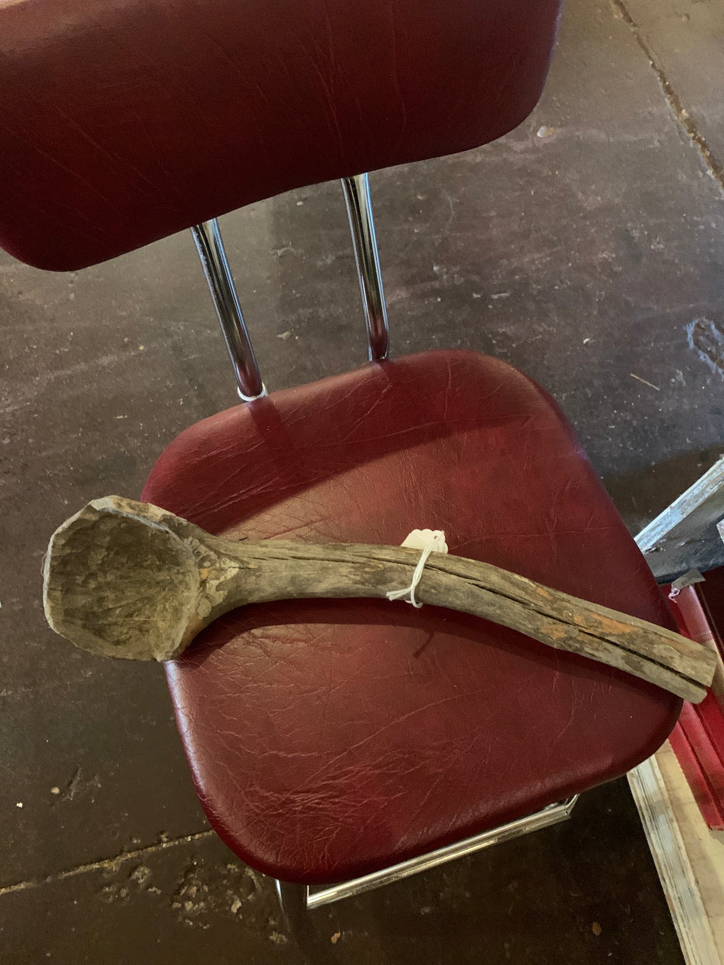 Primitive wooden hand carved spoon