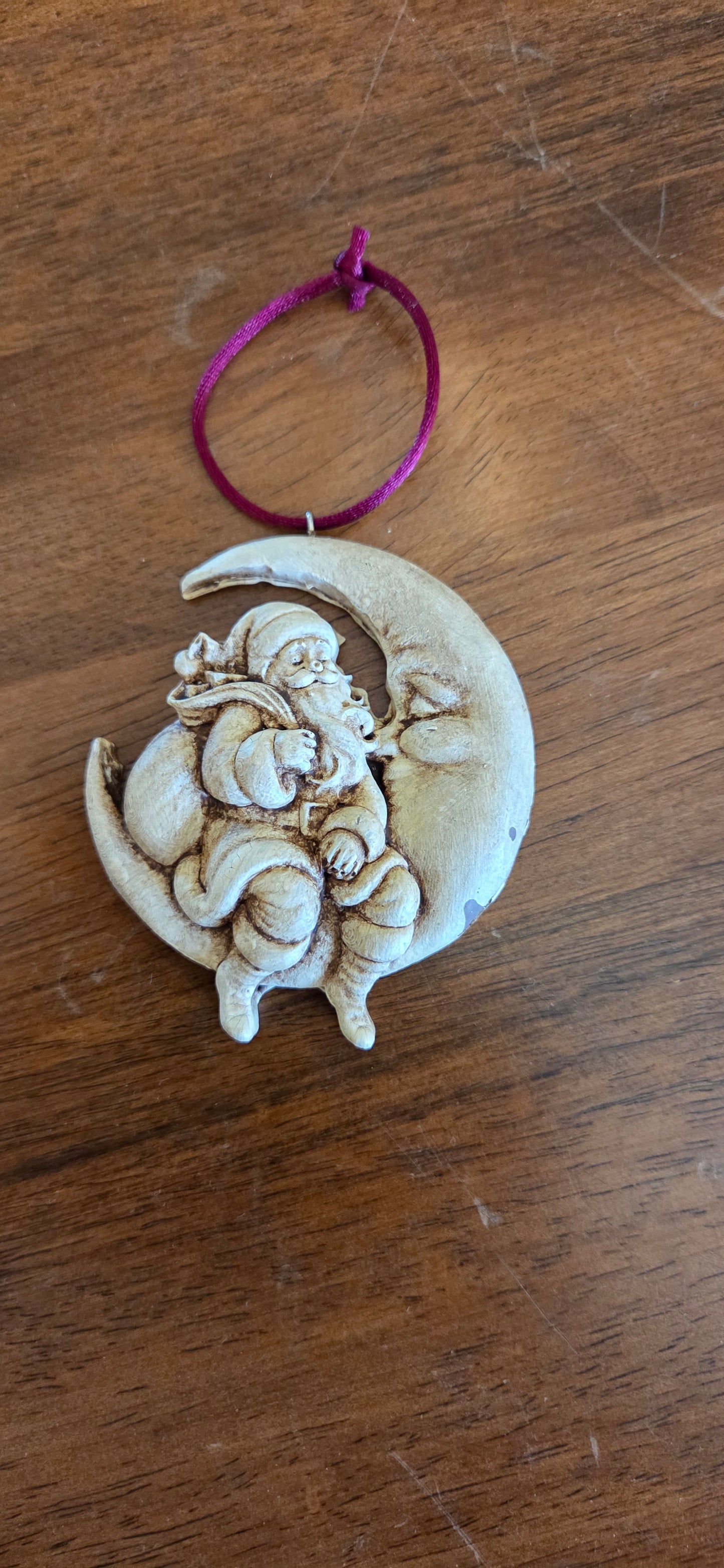 Santa on the moon ornament