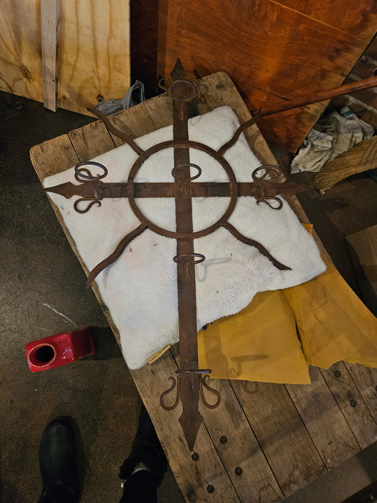 Wrought iron wall hanger with votives