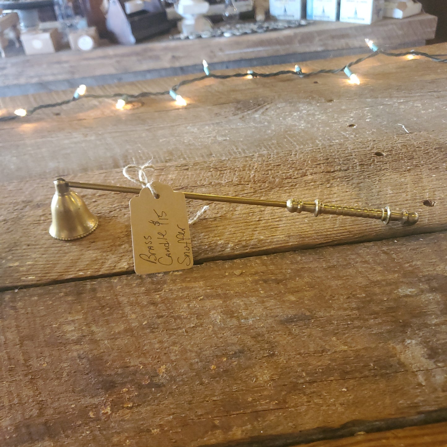 Brass candle snuffer