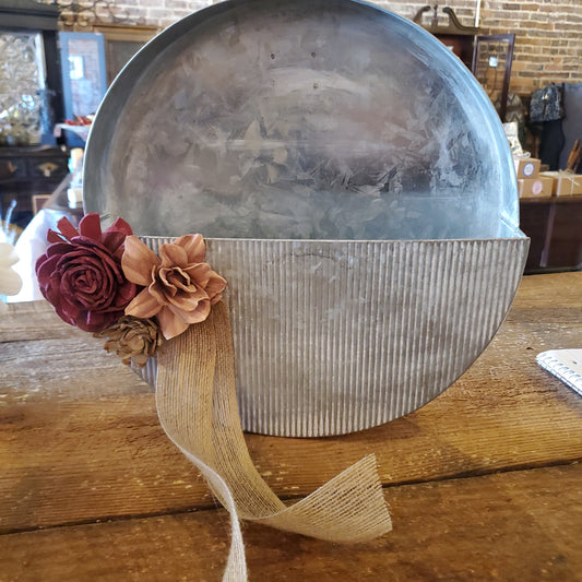 Large hanging tin with flowers
