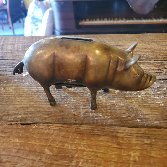 Brass coin pig