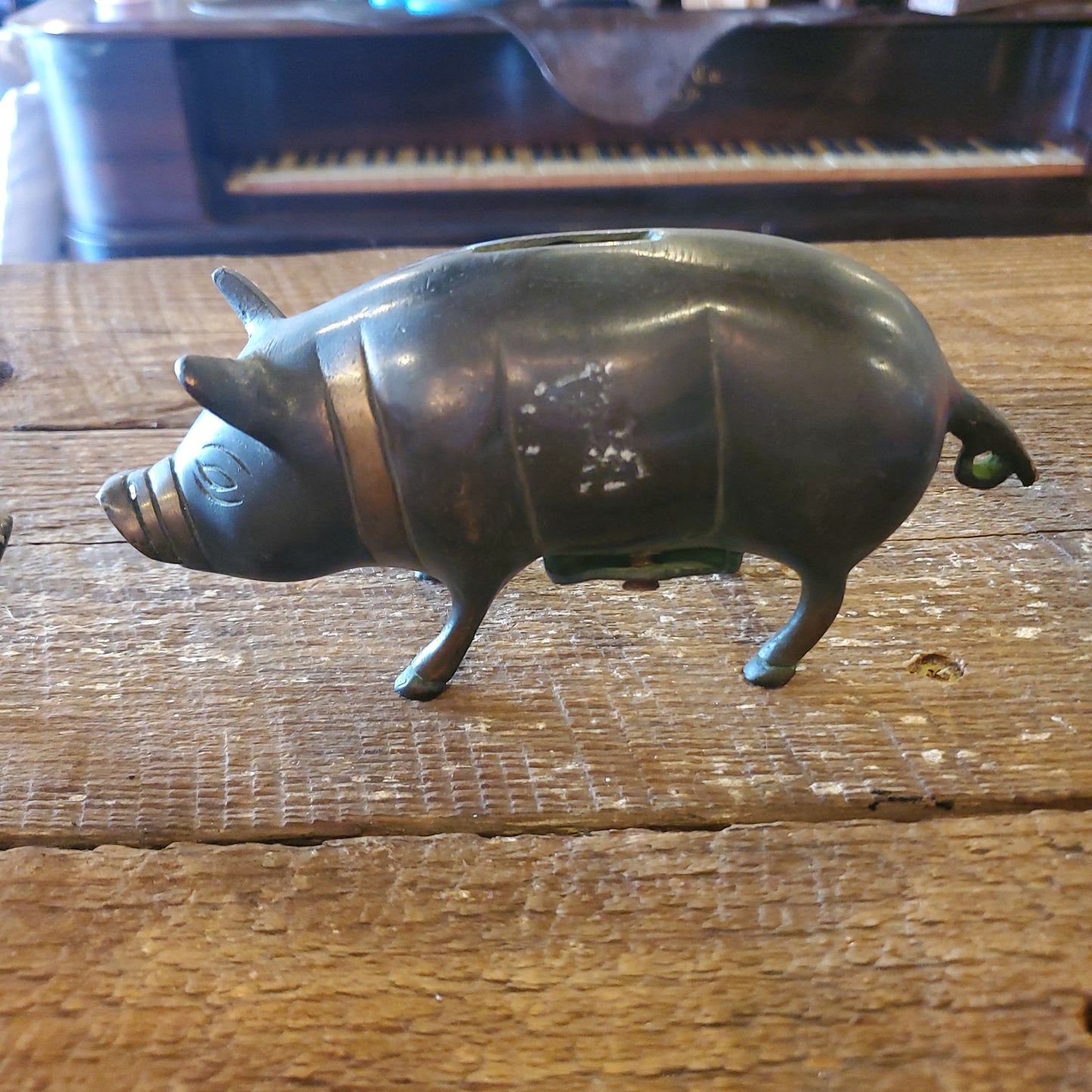Brass coin pig