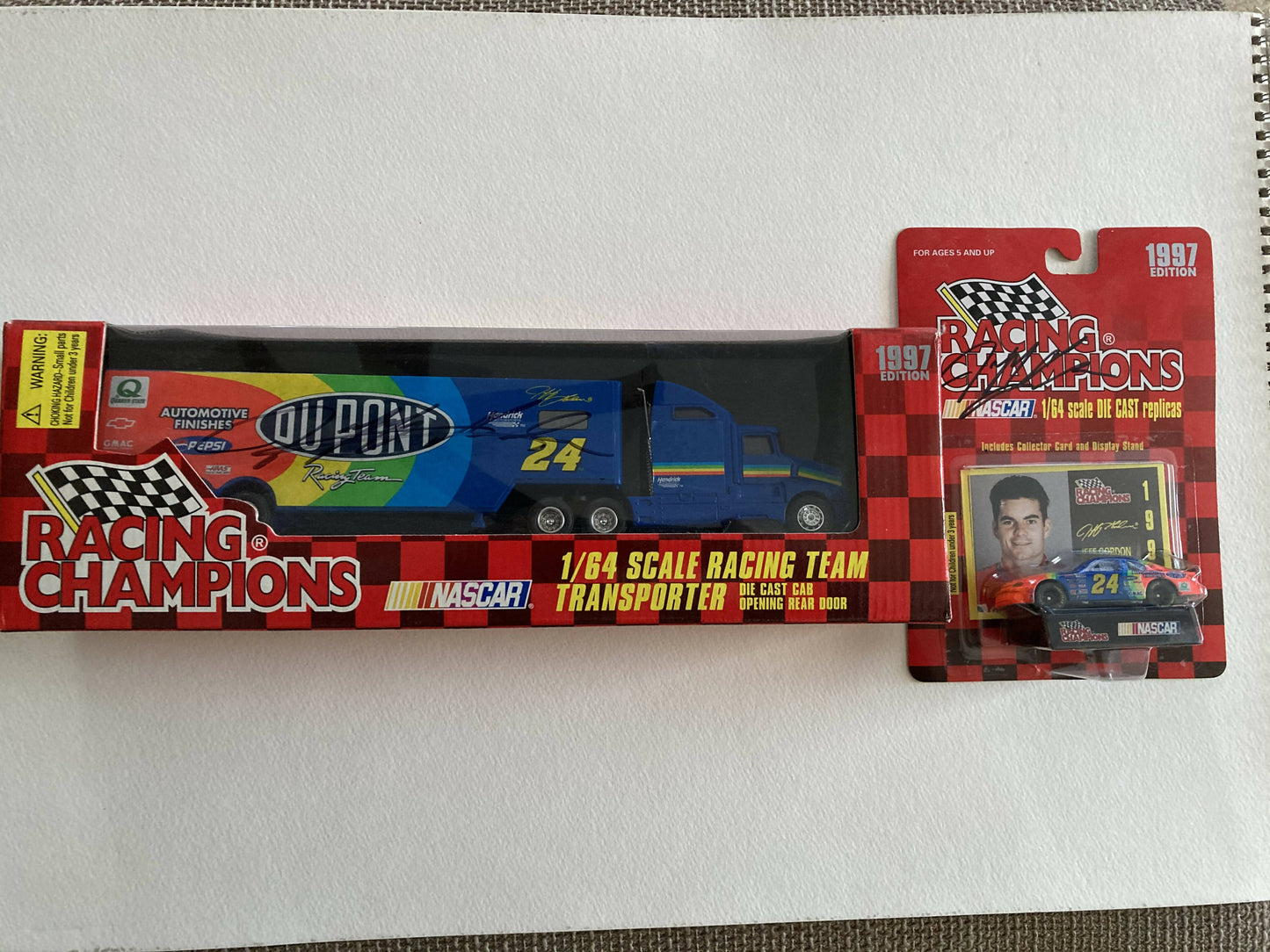 Sports Toy = 1997 Racing Champions 1/64 Stock Car & Transporter both signed by Jeff Gordon